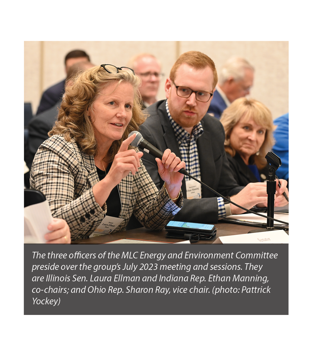Photo of MLC Energy & Environment Committee Co-Chair Illinois Sen. Laura Ellman speaking during the committee's July 9 meeting, as Co-Chair Indiana Rep. Ethan Manning and Vice Chair Ohio Rep. Sharon Ray look on.